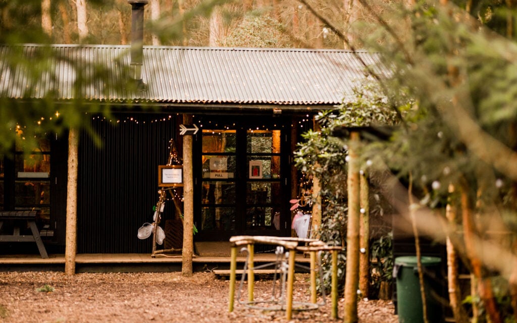 Entrance to a woodland cafe at The Dreamery Hideaway
